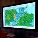 Reka bentuk landskap 3D di skrin komputer.